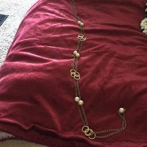 A 24’ inch necklace with pearls an gold circles